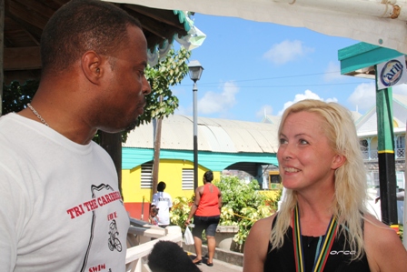 Deputy Premier of Nevis and Minister of Tourism and Sports Hon. Mark Brantley with Ms. Pam Challen United Kingdom winner of a trip to Nevis sponsored by Chain Reaction Cycles in collaboration with Nisbet Plantation Inn, the St. Kitts and Nevis Triathlon Federation and the Nevis Tourism Authority